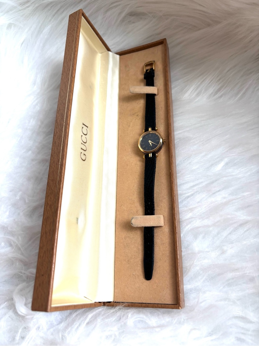 Gucci Black Leather Strap Gold Tone Round Dial Women’s Watch